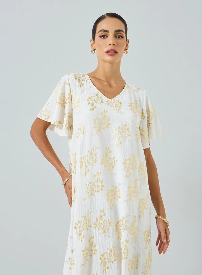 تايك تو جلابية بطبعة زهور وأكمام قصيرة